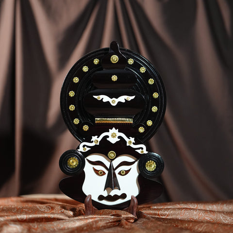 kathakali head hanging